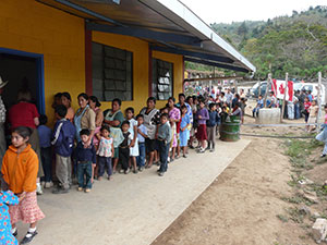 Line-up of people waiting for treatment